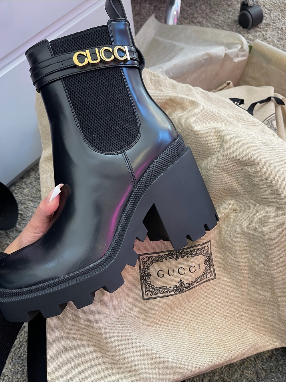 Gucci Black Lug-Sole Chelsea Boot with Gold Logo Strap